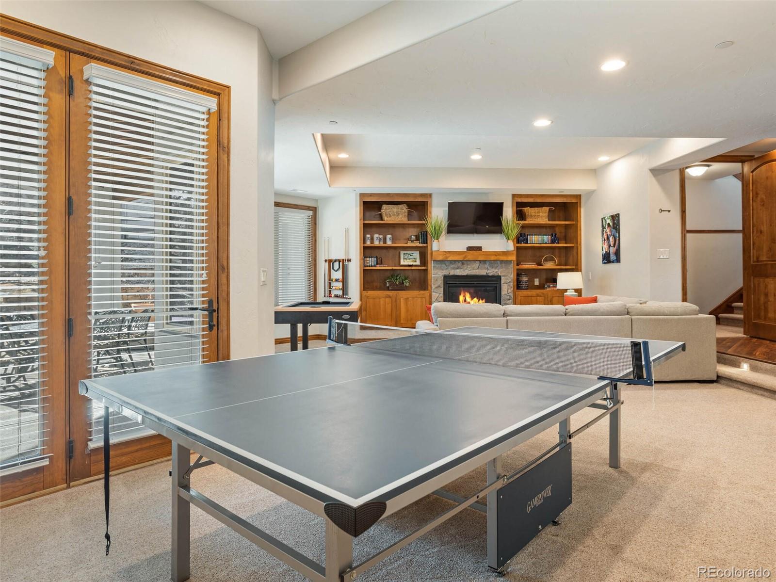 1176 Buffalo Ridge Road Castle Pines, CO 80108 - Photo 31 of 37 a room with table and window