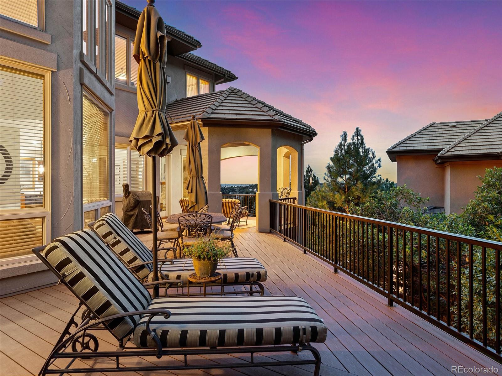 1176 Buffalo Ridge Road Castle Pines, CO 80108 - Photo 37 of 37 a view of a balcony with chairs
