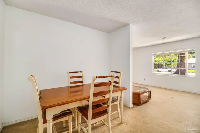 a bathroom with a granite countertop toilet sink and bathtub