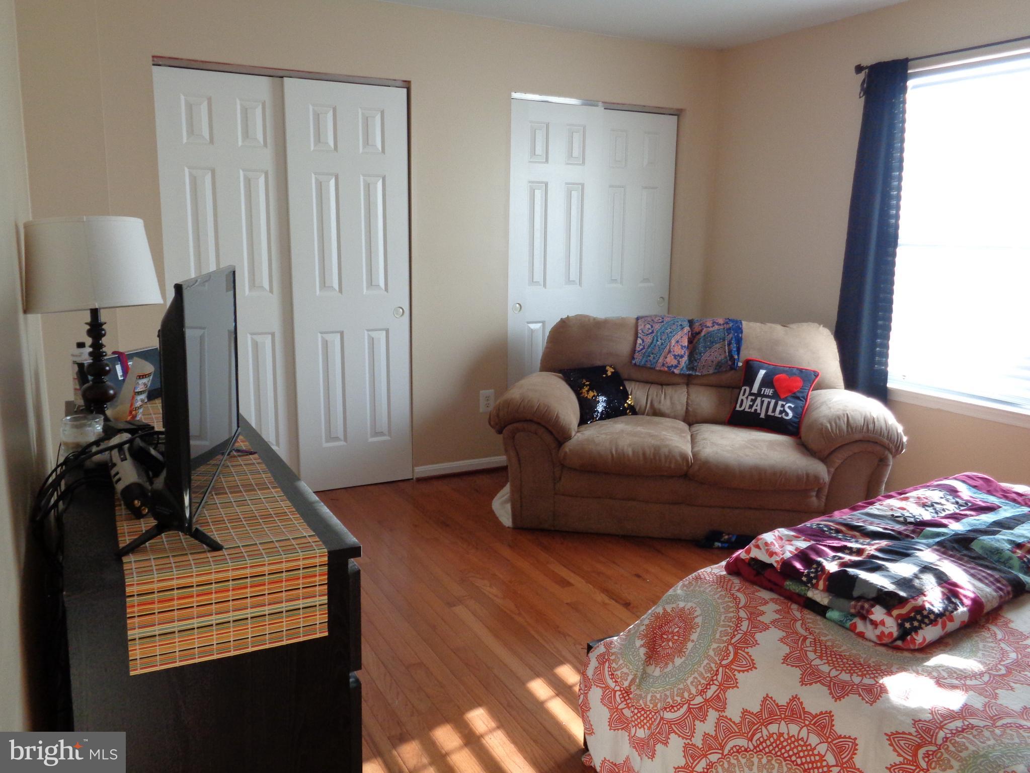 1319 Waterview Way Baltimore, MD 21221 - Photo 16 of 26 Hardwoods, dual closets, neutral decor