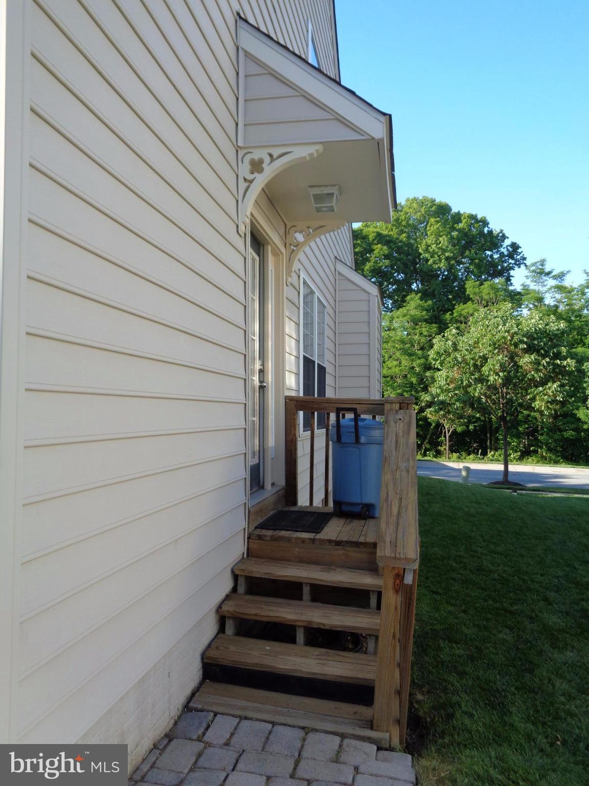 1319 Waterview Way Baltimore, MD 21221 - Photo 21 of 26 Side door exit to backyard paver patio