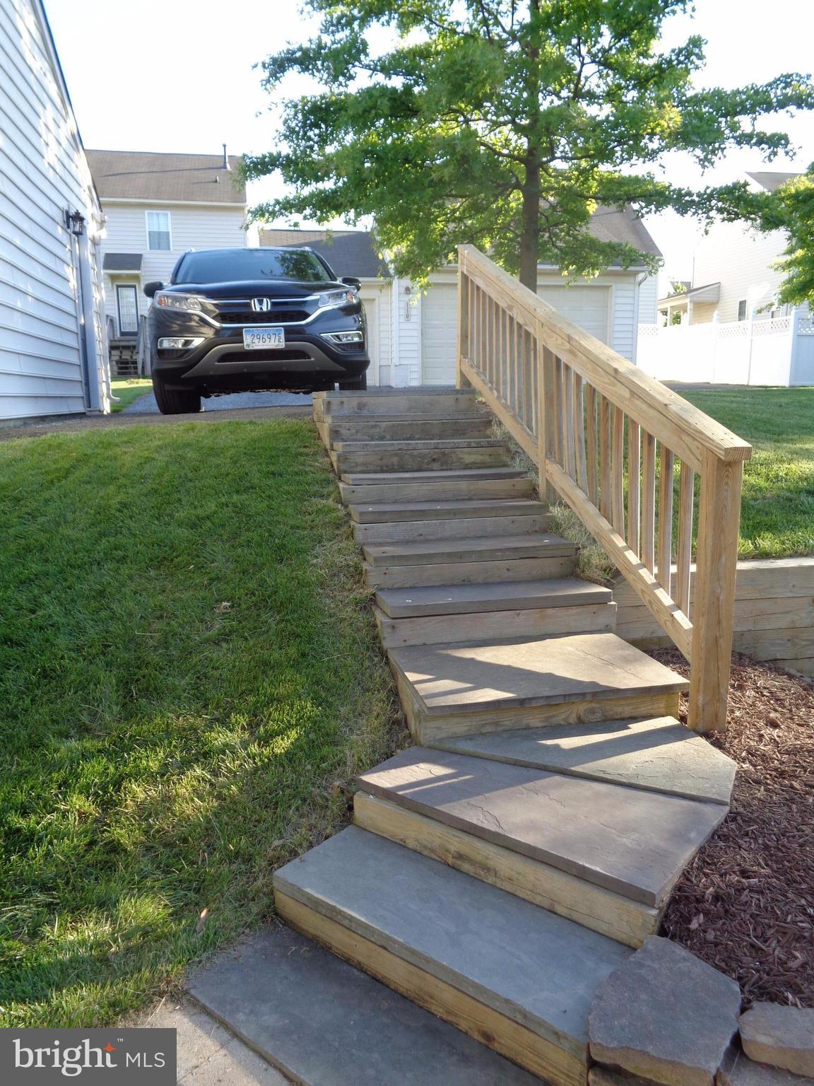 1319 Waterview Way Baltimore, MD 21221 - Photo 23 of 26 Walkway to parking area and garage