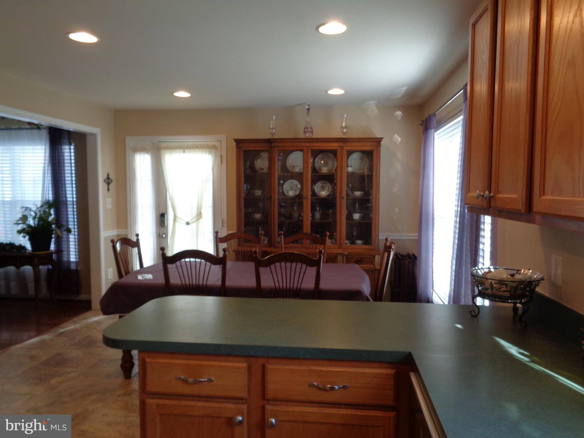 adjoins living room for seamless entertaining...