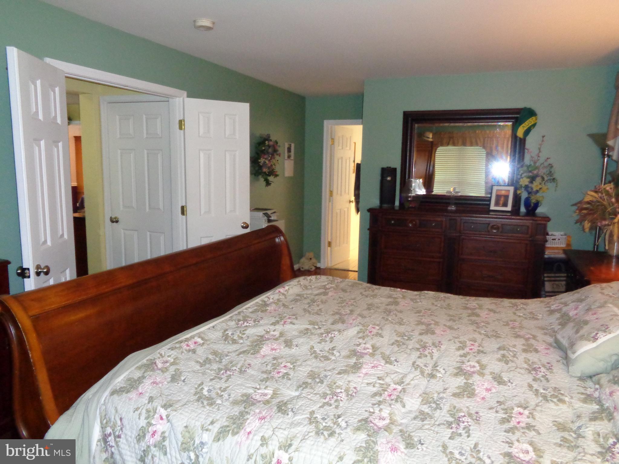1319 Waterview Way Baltimore, MD 21221 - Photo 10 of 26 Main level master with gleaming hardwoods