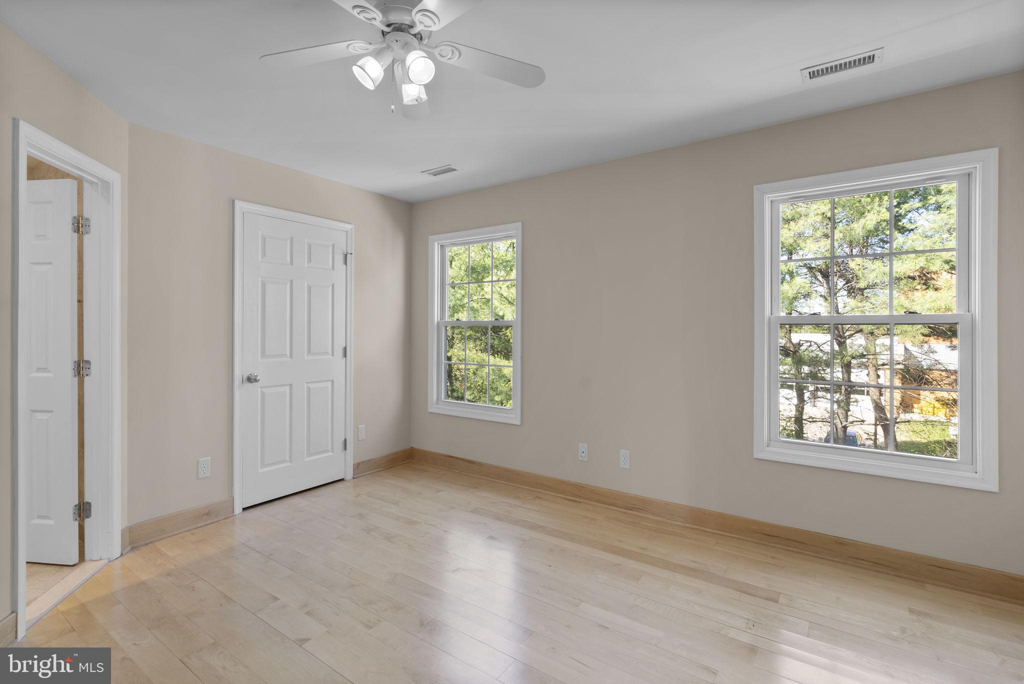 1304 Hill Born Drive Hanover, MD 21076 - Photo 18 of 47 a view of an empty room with a window