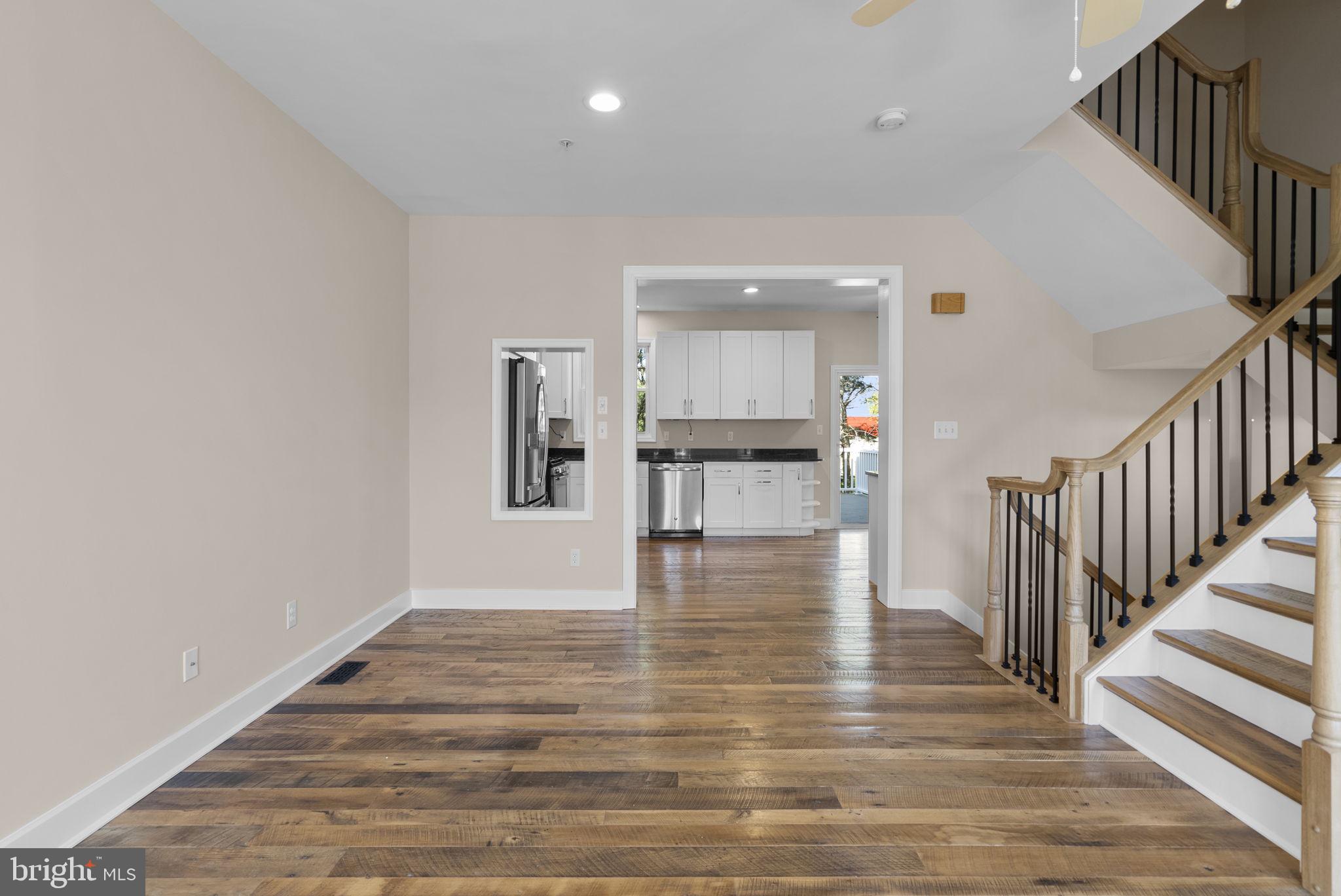 1304 Hill Born Drive Hanover, MD 21076 - Photo 5 of 47 a view of a kitchen with wooden floor and a window
