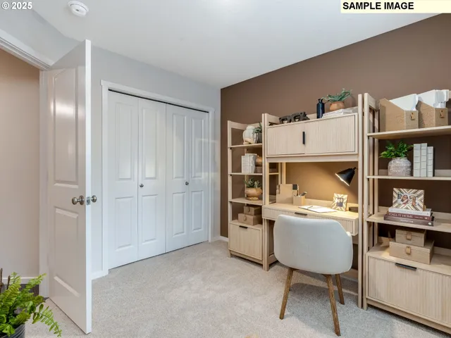 a room with furniture and white walls