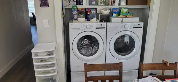 a utility room with dryer and washer
