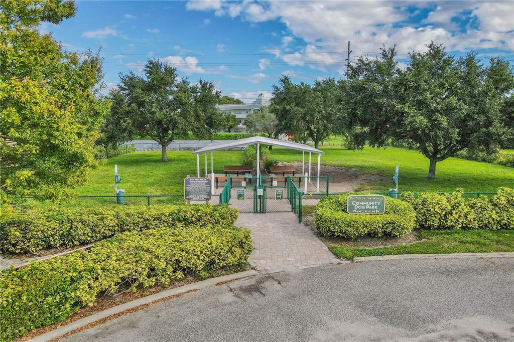 2402 Ecuadorian Way, Unit 18 Clearwater, FL 33763 - Photo 34 of 54 a view of a garden with a flower garden