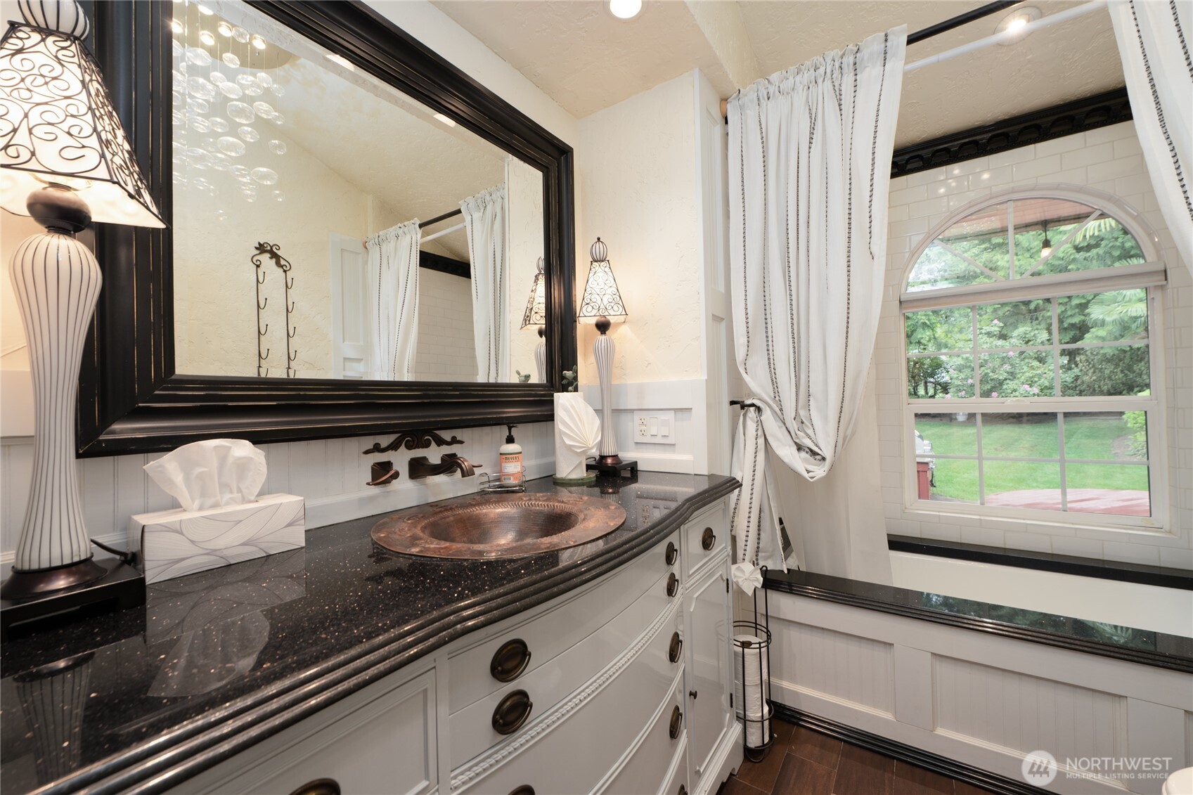 14615 205th Avenue Southeast Renton, WA 98059 - Photo 18 of 40 a bathroom with a granite countertop sink and a large mirror