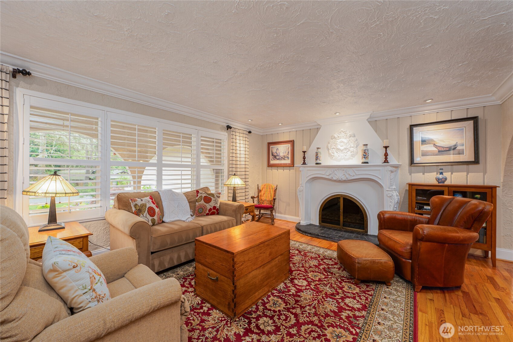 14615 205th Avenue Southeast Renton, WA 98059 - Photo 2 of 40 a living room with furniture large window and a fireplace