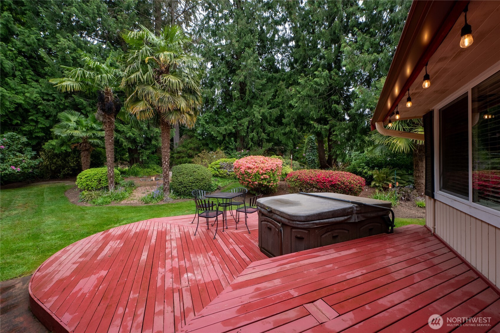 14615 205th Avenue Southeast Renton, WA 98059 - Photo 24 of 40 a patio with wooden floor and outdoor seating