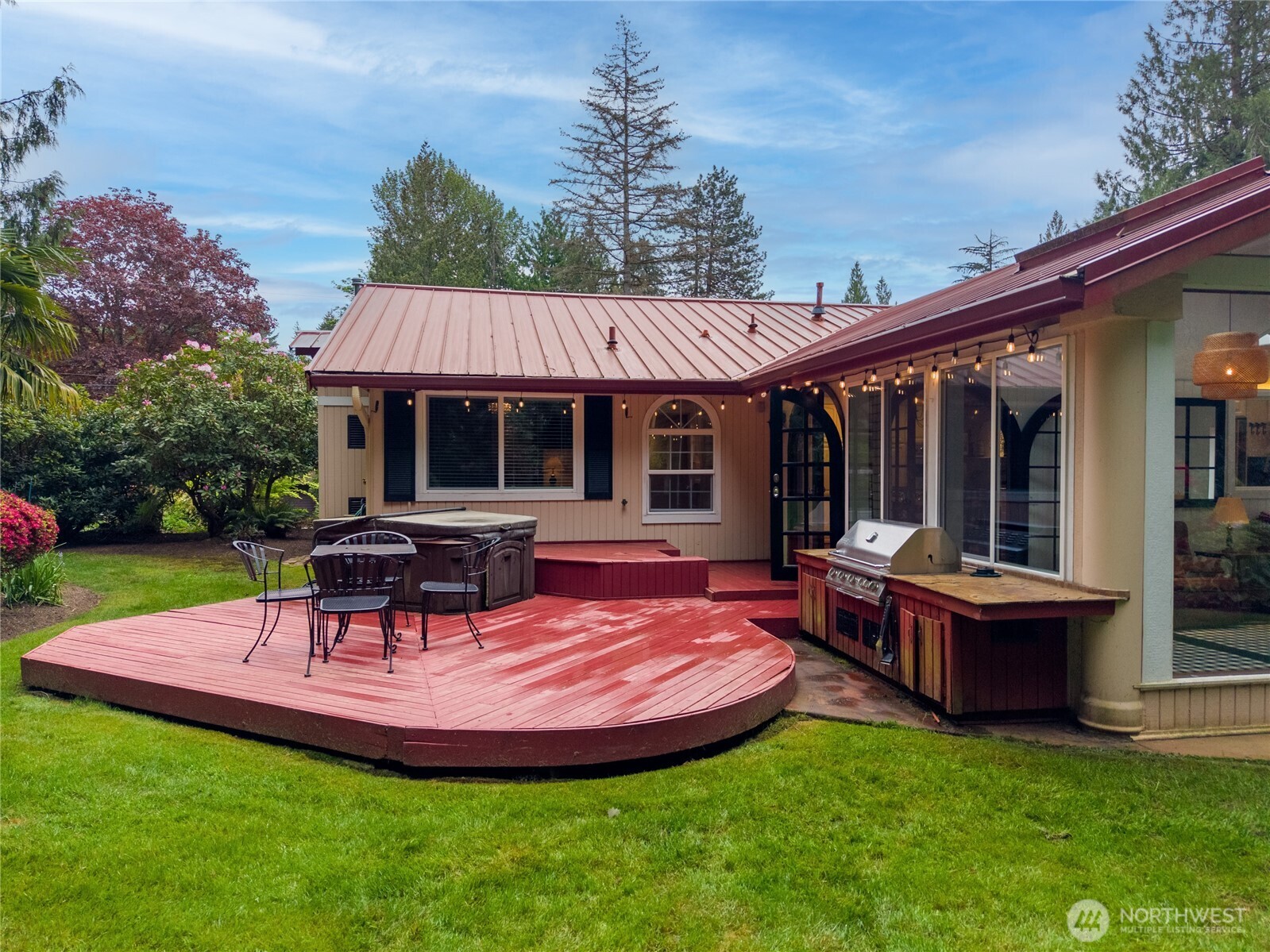 14615 205th Avenue Southeast Renton, WA 98059 - Photo 27 of 40 a view of a house with backyard porch and sitting area