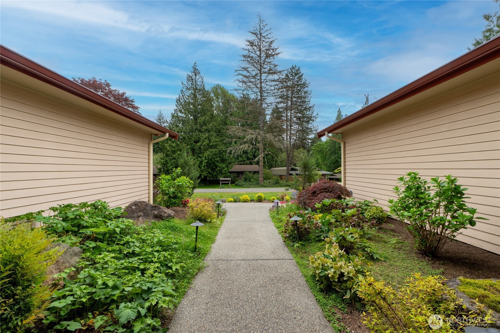 14615 205th Avenue Southeast Renton, WA 98059 - Photo 37 of 40 a view of a backyard with potted plants