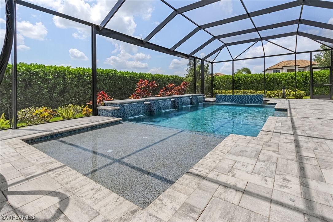 17405 Cabrini Way Estero, FL 33928 - Photo 17 of 34 a view of a patio