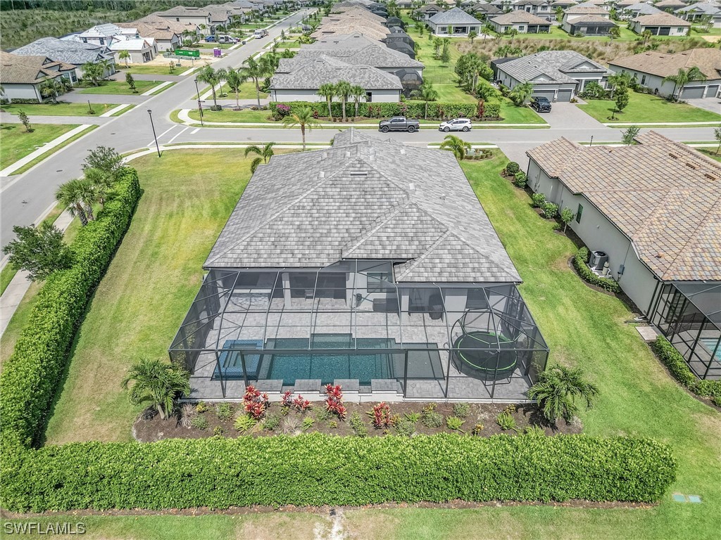 17405 Cabrini Way Estero, FL 33928 - Photo 32 of 34 an aerial view of a house