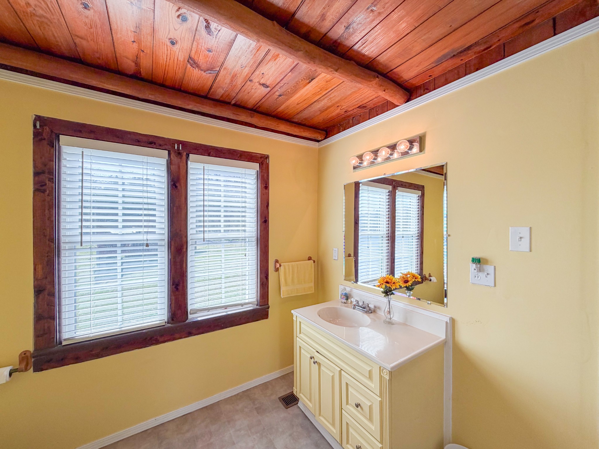 2701 Clear Creek Road Pulaski, TN 38478 - Photo 16 of 42 a bathroom with a sink and a mirror