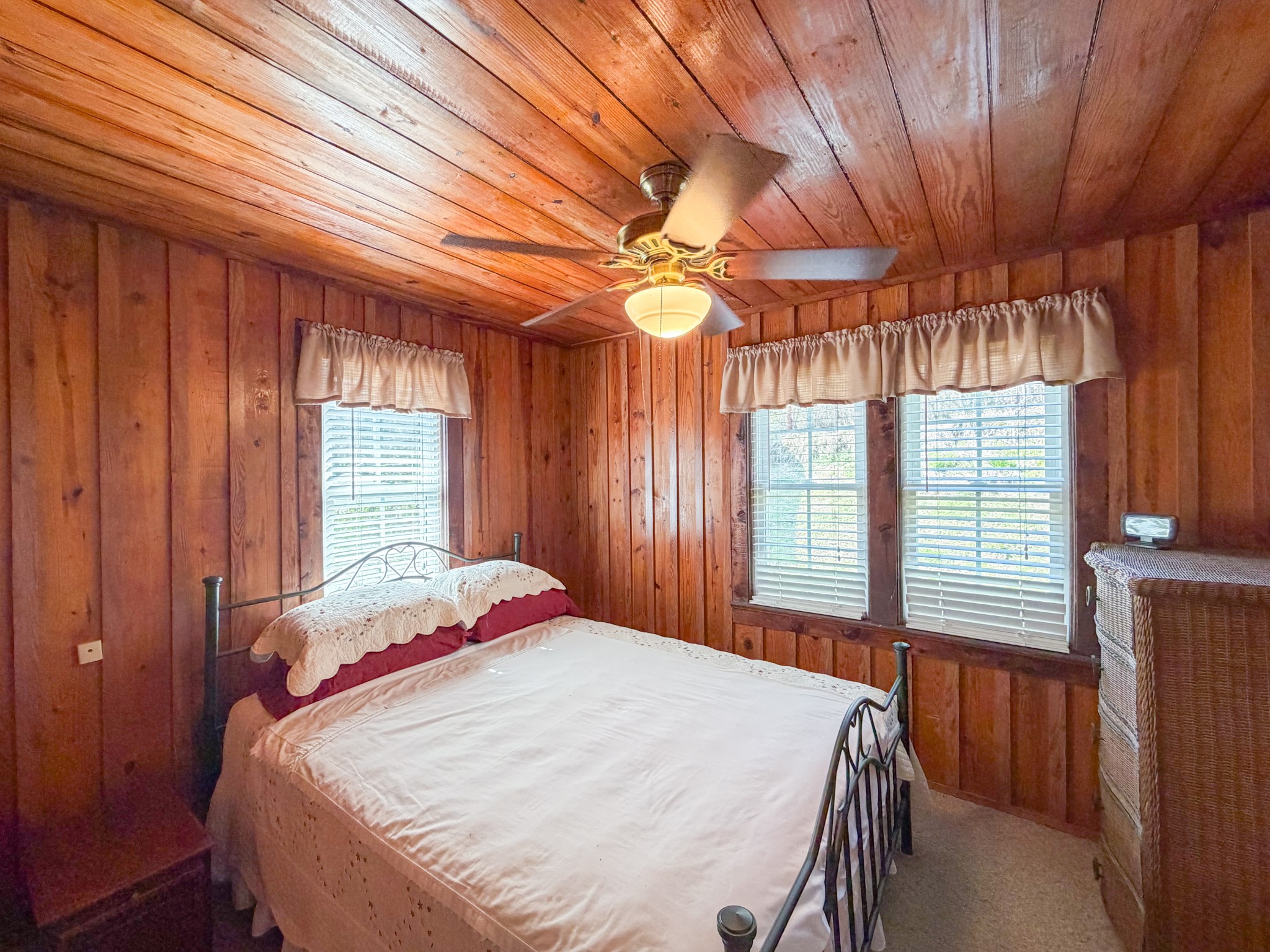 2701 Clear Creek Road Pulaski, TN 38478 - Photo 20 of 42 a bed sitting in a bedroom next to a window