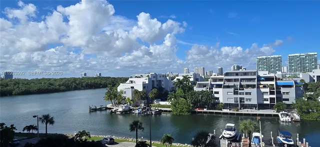 a view of a lake with a city