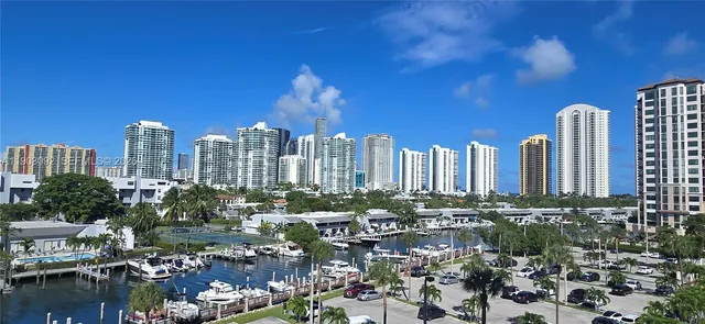 a view of a city with tall buildings