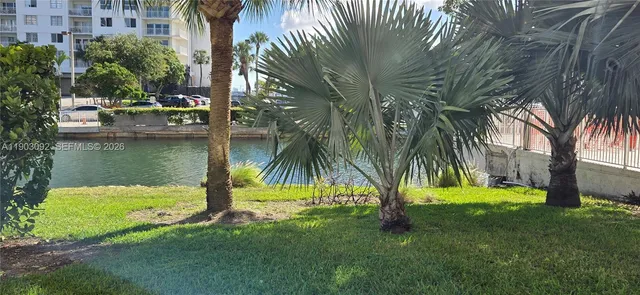 a view of a chairs and tables in the balcony