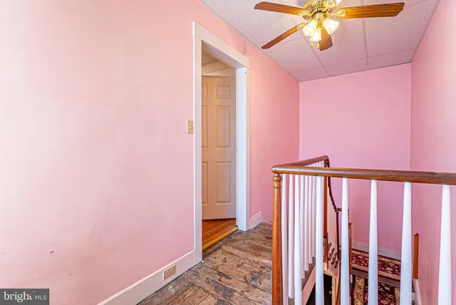 a view of a hallway with a workspace