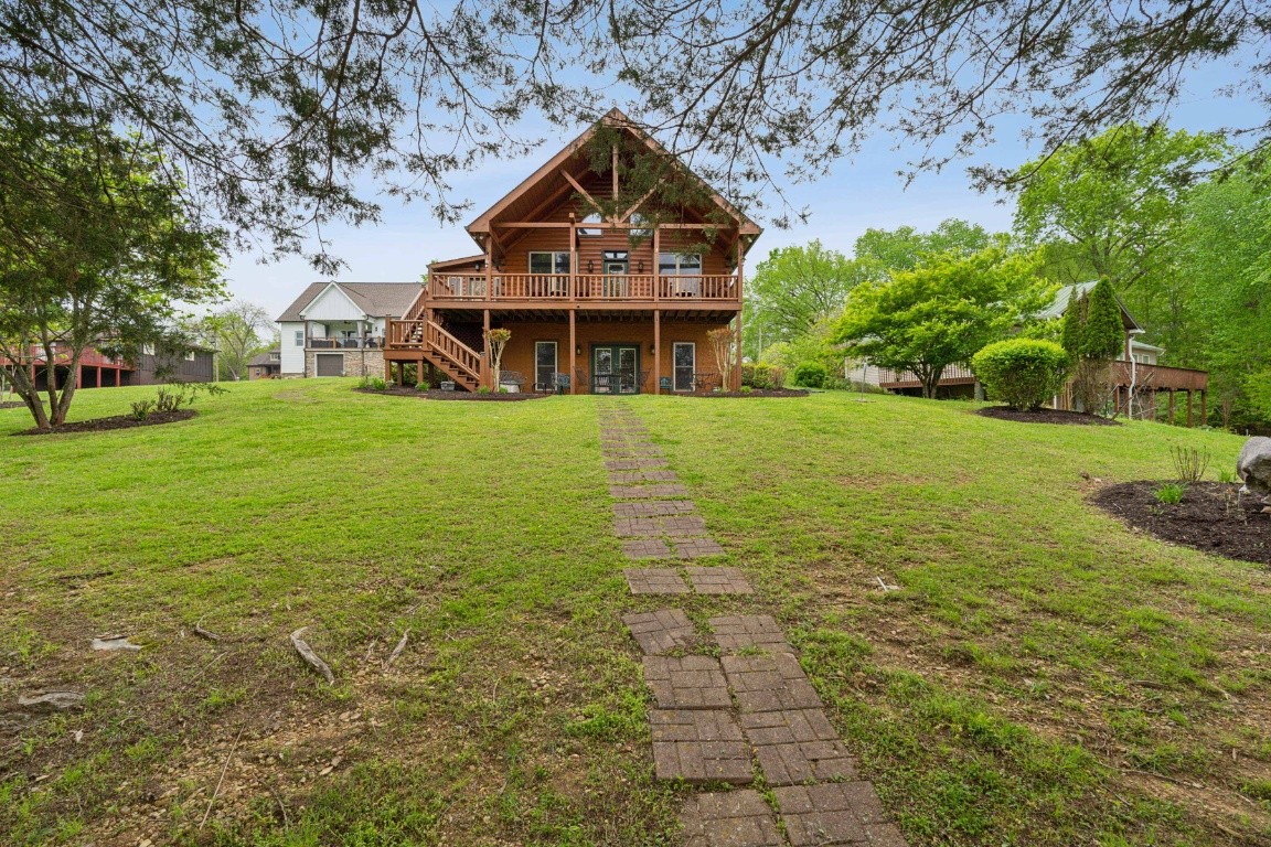 711 Pebble Point Road Lebanon, TN 37087 - Photo 11 of 13 a front view of a house with a yard