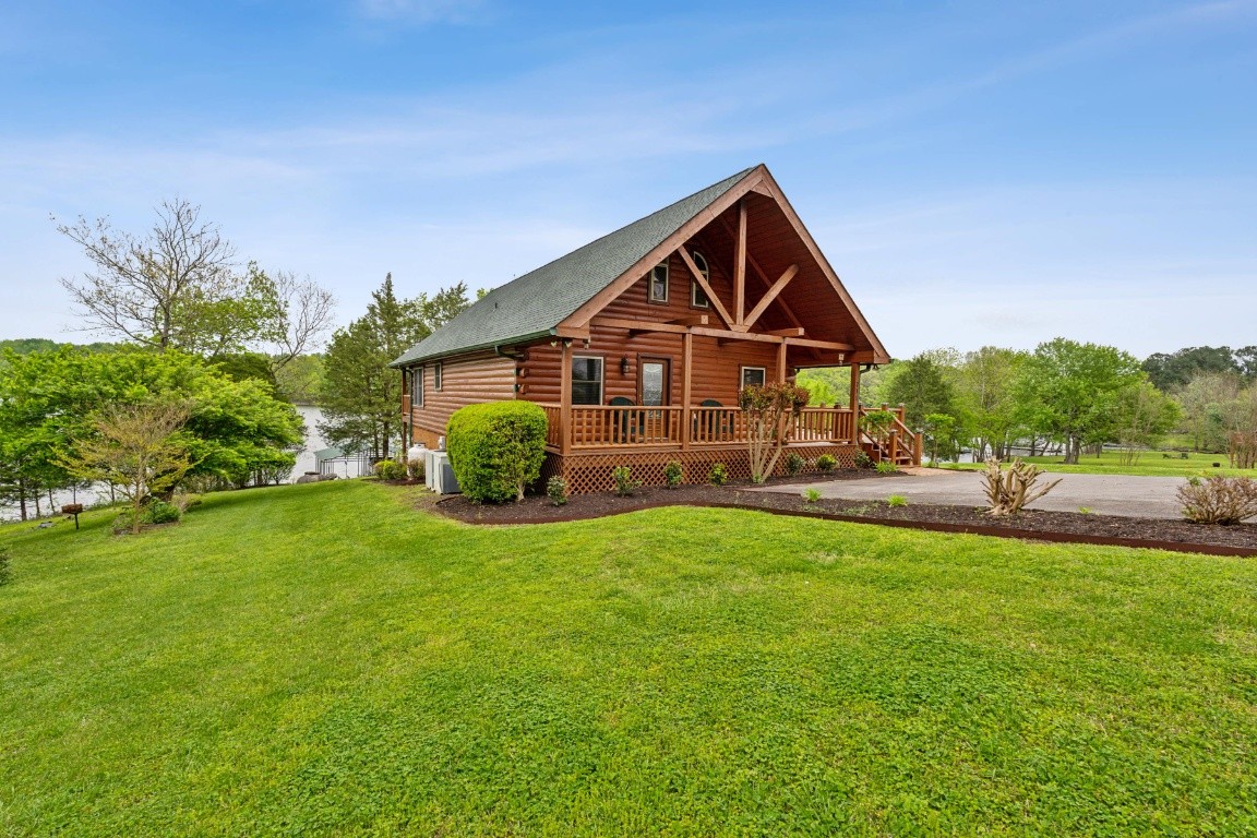 711 Pebble Point Road Lebanon, TN 37087 - Photo 2 of 13 a front view of a house with a yard
