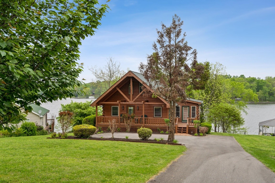 711 Pebble Point Road Lebanon, TN 37087 - Photo 3 of 13 a front view of a house with a yard