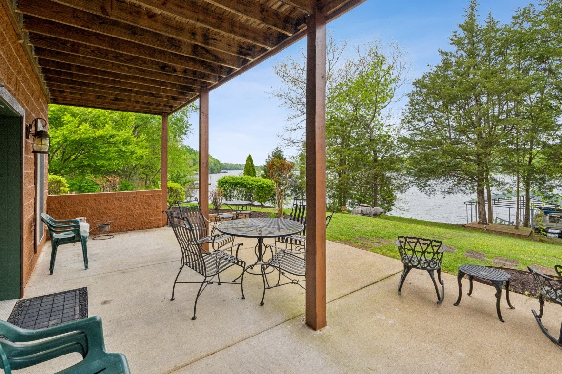 711 Pebble Point Road Lebanon, TN 37087 - Photo 7 of 13 a view of a porch with furniture and a yard