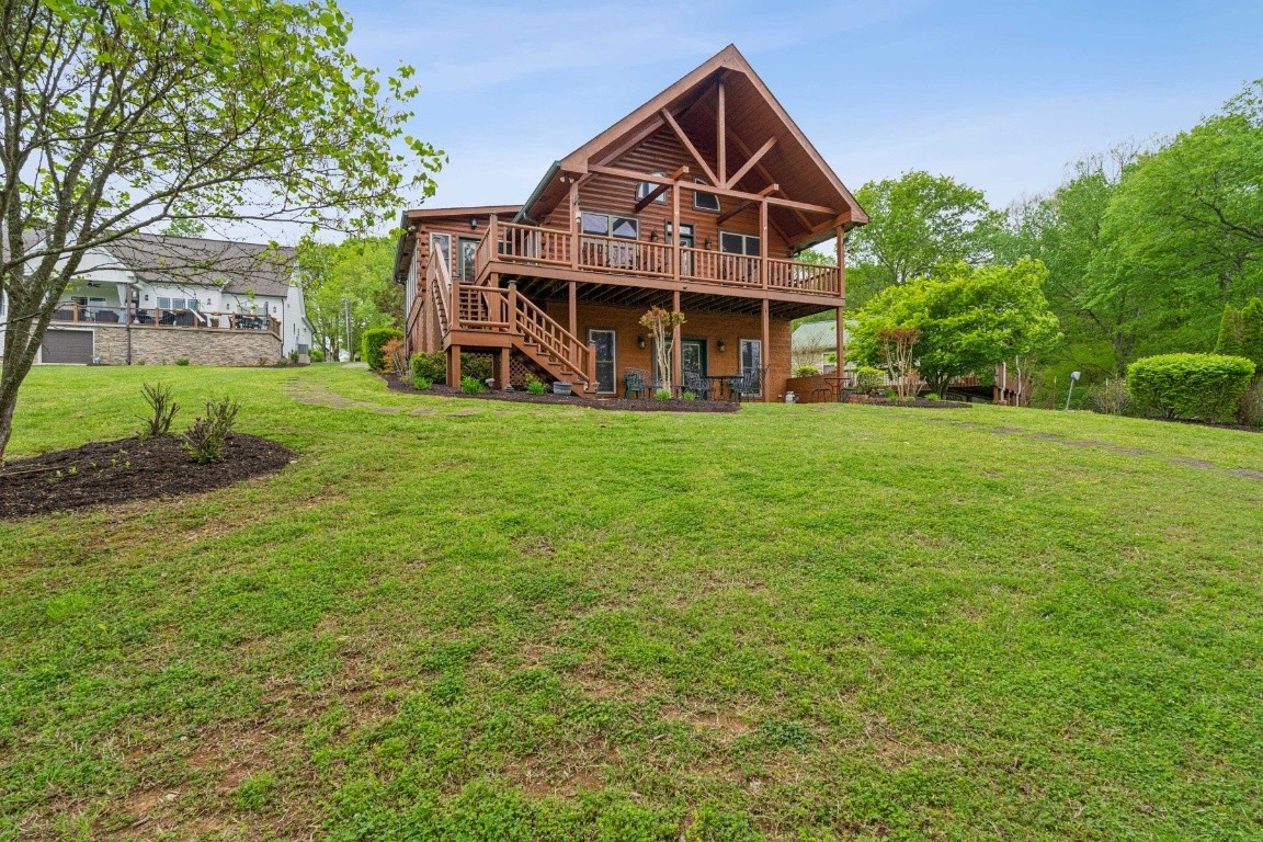 711 Pebble Point Road Lebanon, TN 37087 - Photo 9 of 13 a front view of a house with a yard