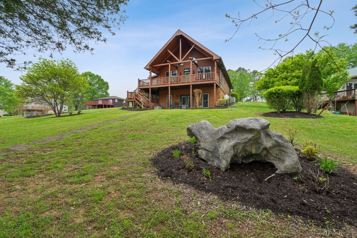 711 Pebble Point Road Lebanon, TN 37087 - Photo 10 of 13 a front view of a house with garden
