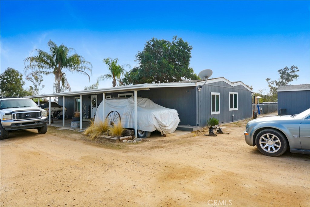 30525 Old Windmill Road Menifee, CA 92584 - Photo 11 of 17 a view of a car in front of a house