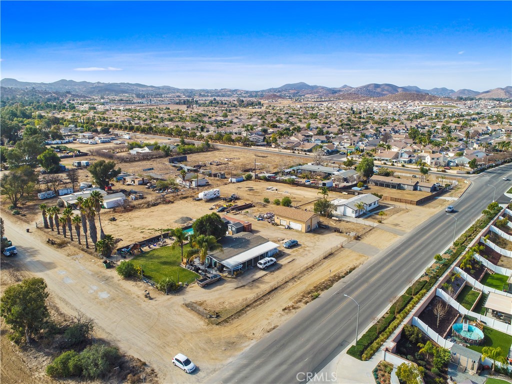 30525 Old Windmill Road Menifee, CA 92584 - Photo 2 of 17 an aerial view of residential houses with city view