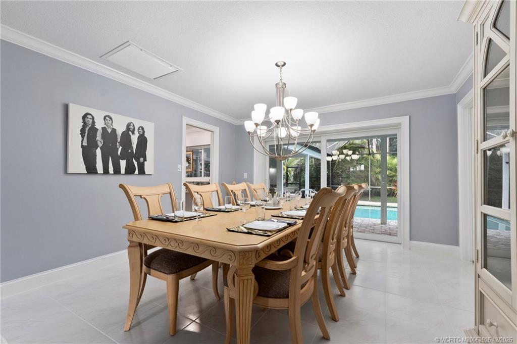 20 Banyan Road Stuart, FL 34996 - Photo 19 of 95 a view of a dining room with furniture window and outside view
