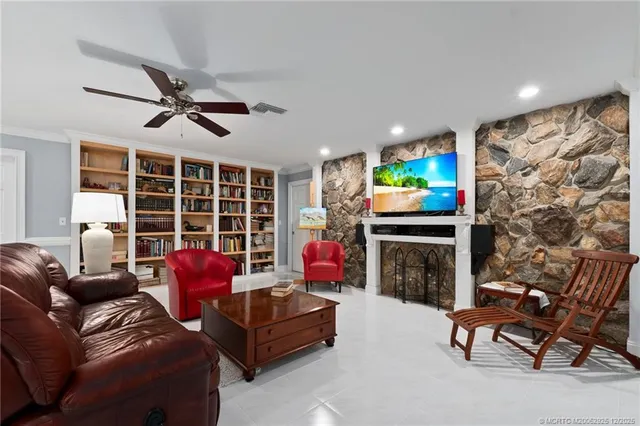 a view of a house with a backyard and a patio