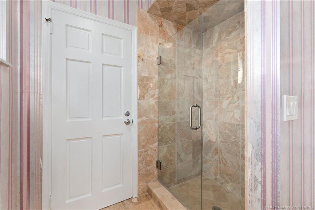 20 Banyan Road Stuart, FL 34996 - Photo 49 of 95 a bathroom with a shower