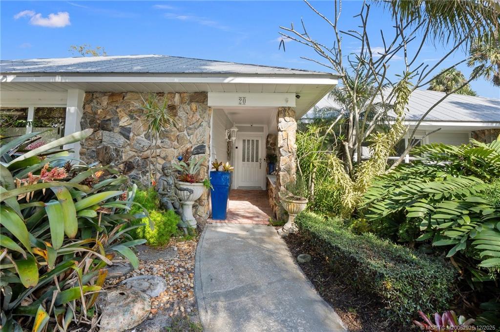 20 Banyan Road Stuart, FL 34996 - Photo 6 of 95 a view of a entryway door of the house
