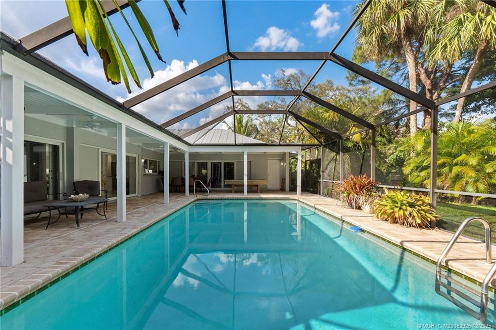 20 Banyan Road Stuart, FL 34996 - Photo 62 of 95 a view of a house with swimming pool