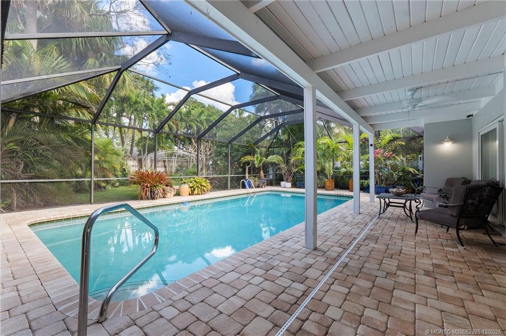 20 Banyan Road Stuart, FL 34996 - Photo 65 of 95 a view of a swimming pool with a patio