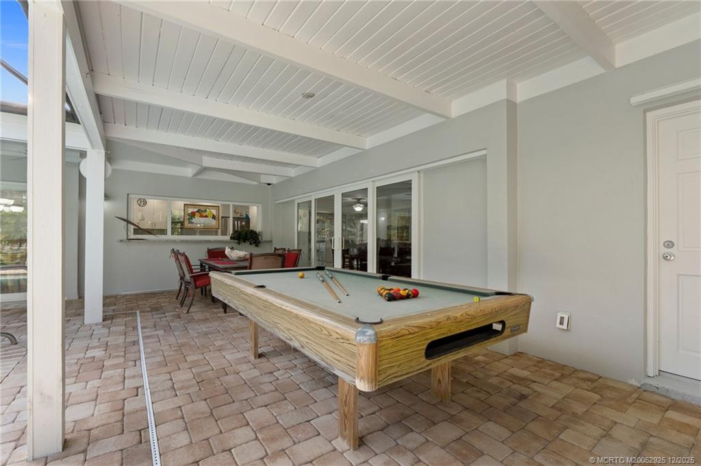 20 Banyan Road Stuart, FL 34996 - Photo 66 of 95 a room with pool table and glass windows