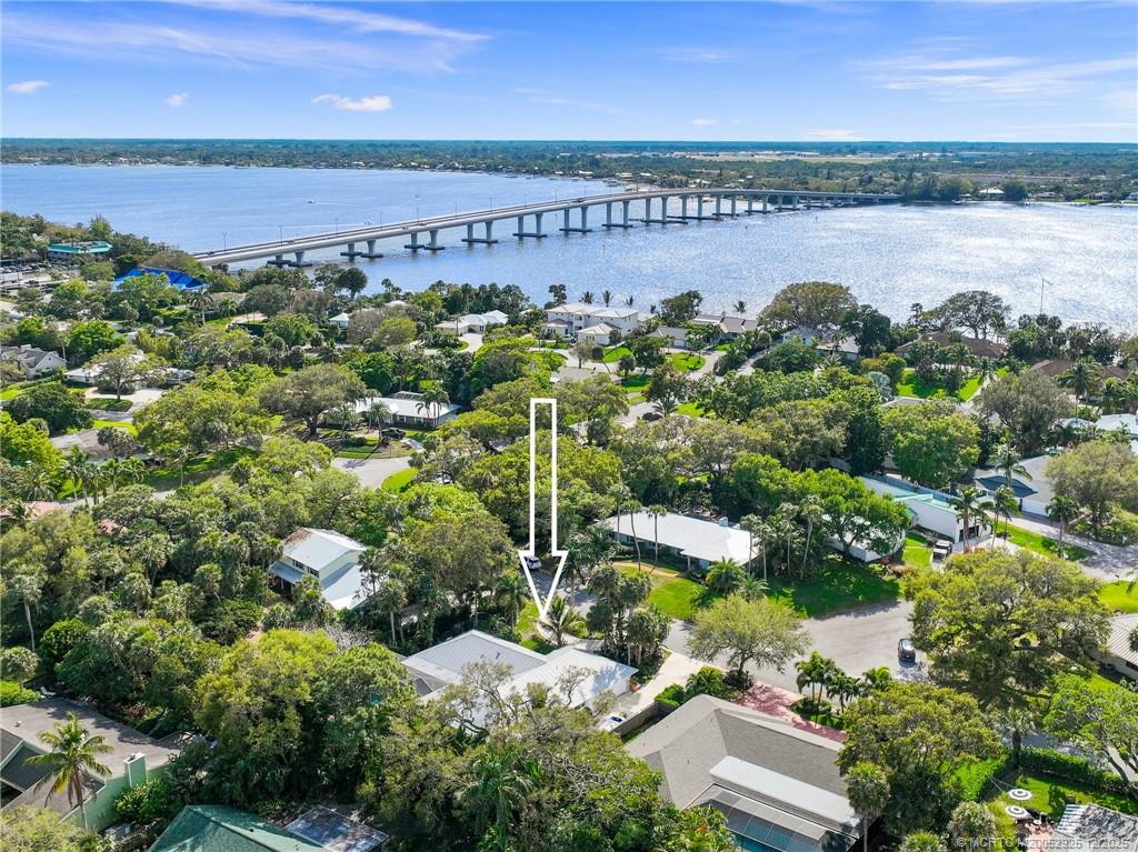 20 Banyan Road Stuart, FL 34996 - Photo 8 of 95 a view of a lake with a building in the back