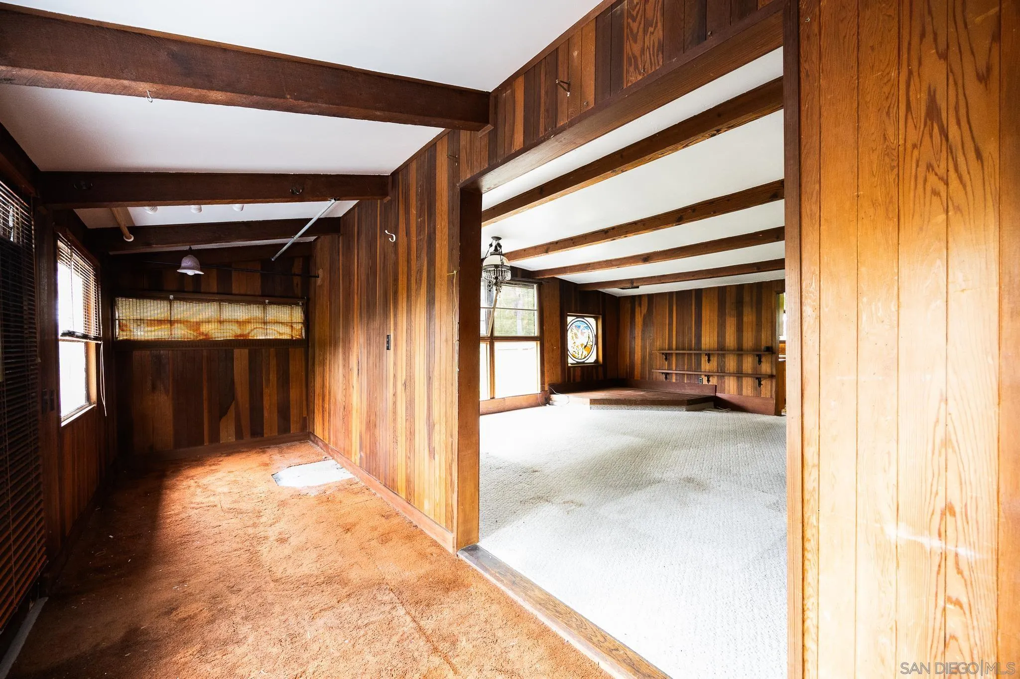 890 Capri Road Encinitas, CA 92024 - Photo 32 of 43 a view of a hallway and an entryway