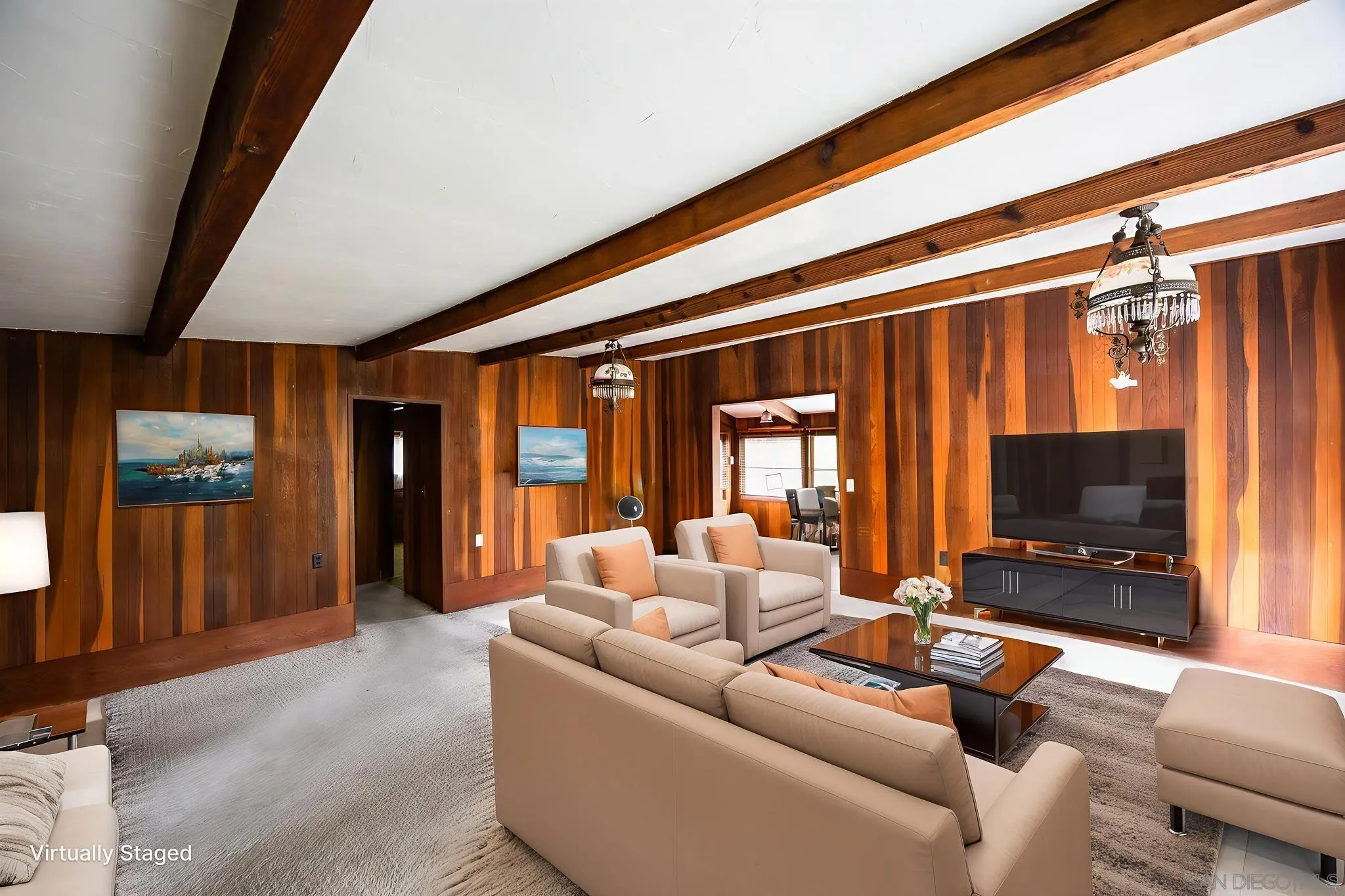 890 Capri Road Encinitas, CA 92024 - Photo 34 of 43 a living room with furniture and a flat screen tv