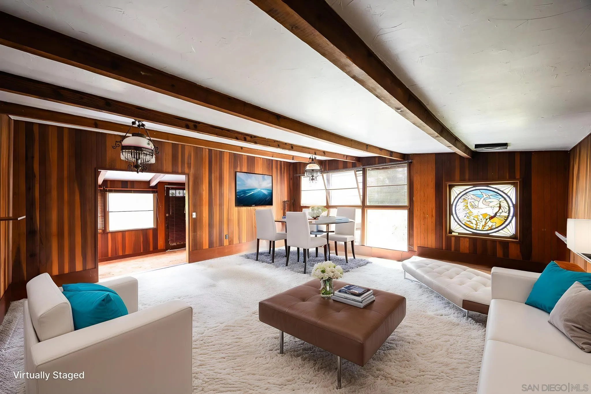 890 Capri Road Encinitas, CA 92024 - Photo 36 of 43 a living room with furniture and a window