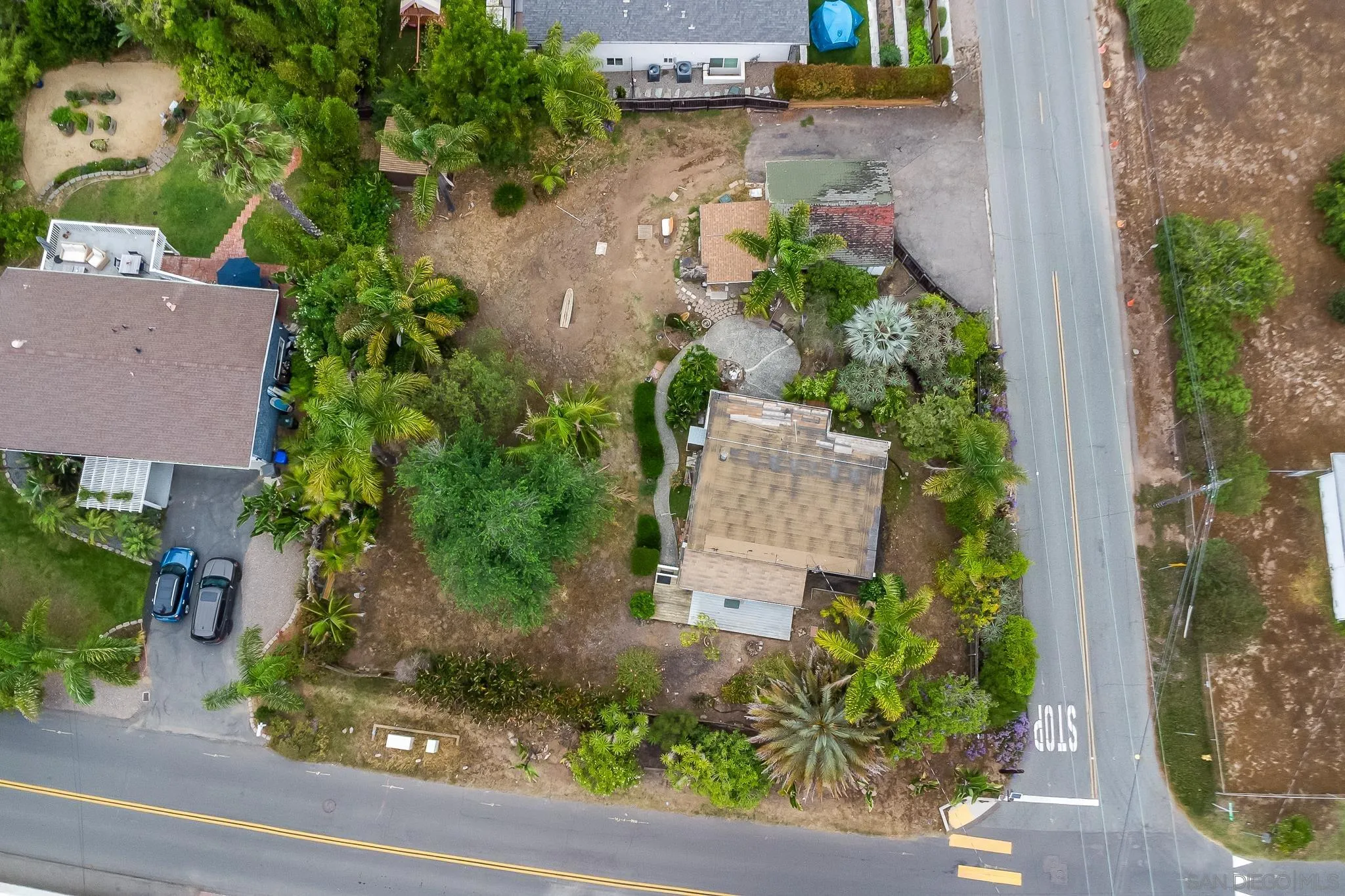 890 Capri Road Encinitas, CA 92024 - Photo 6 of 43 an aerial view of a house with garden space and street view