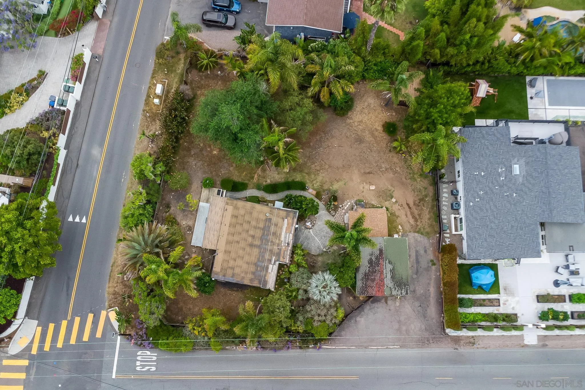 890 Capri Road Encinitas, CA 92024 - Photo 7 of 43 an aerial view of a house with garden space and sitting space