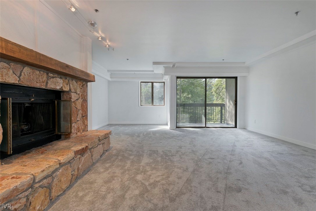333 Ski Way, Unit 281 Incline Village, NV 89451 - Photo 12 of 35 a view of an empty room with a fireplace and a window