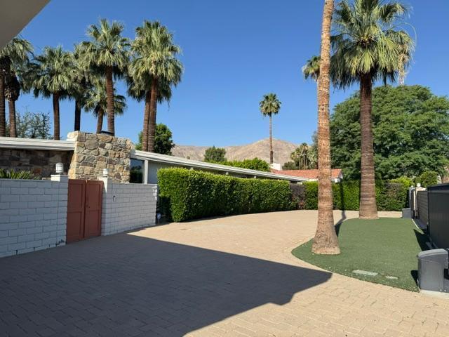 71279 Country Club Drive Rancho Mirage, CA 92270 - Photo 2 of 4 a view of a water fountain in front of a house