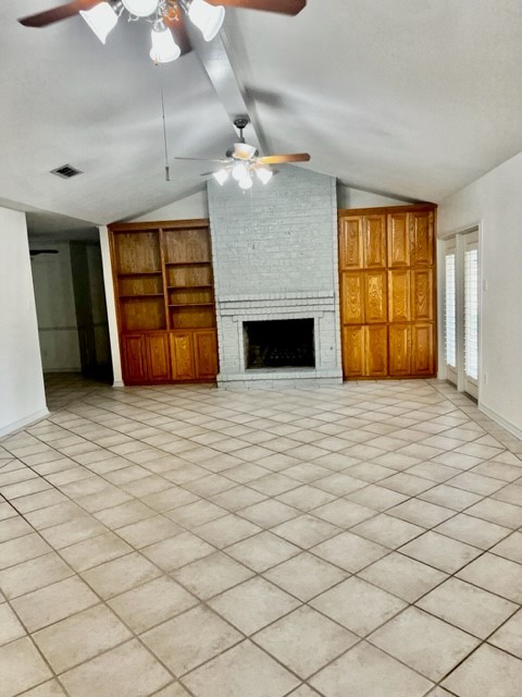 5005 Cascade Drive Corpus Christi, TX 78413 - Photo 3 of 14 an empty room with windows and fireplace